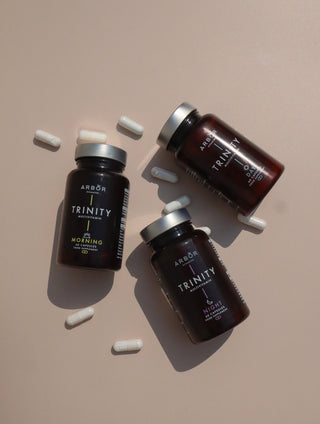 Product photo of our TRINITY morning, TRINITY day and TRINITY night formulas